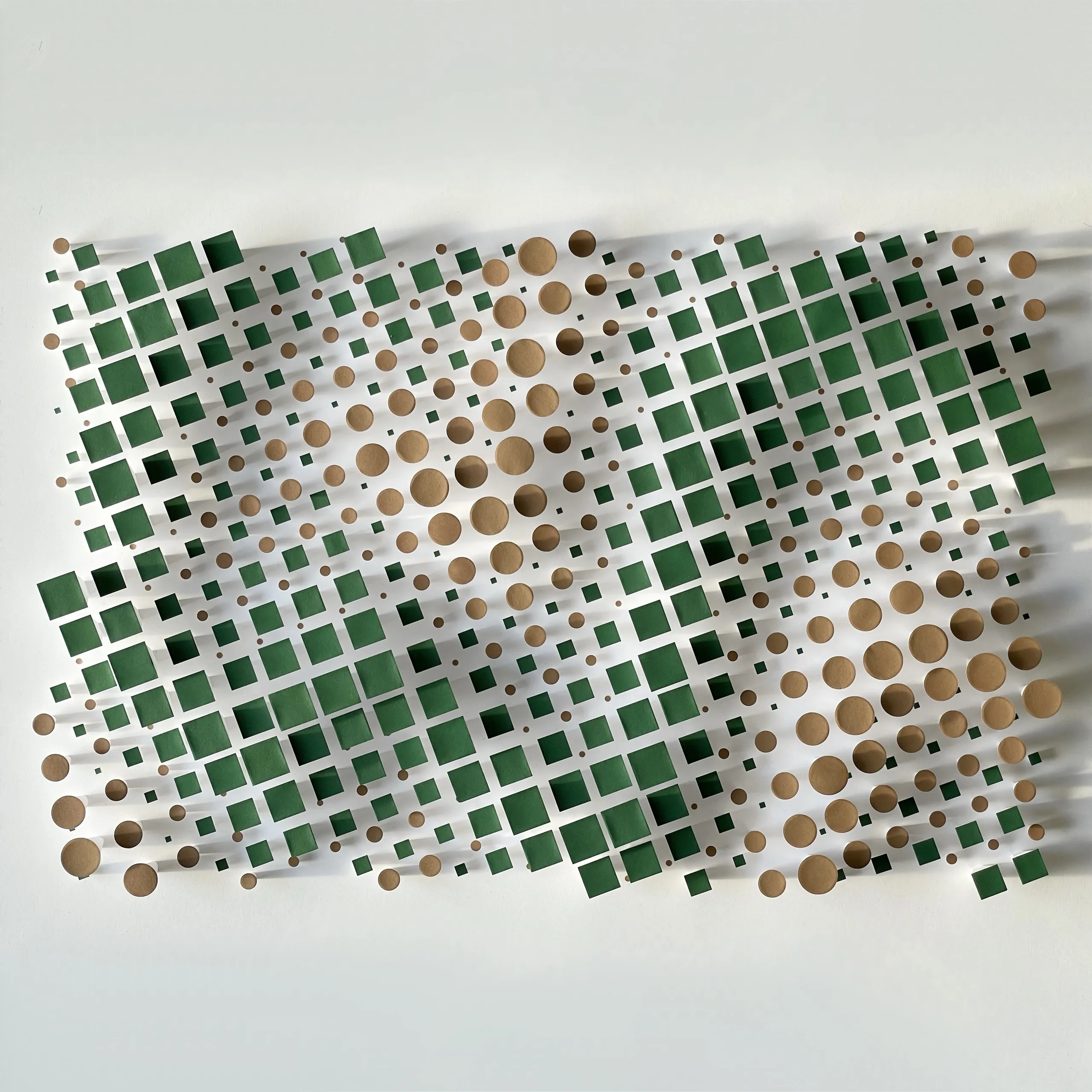 The whole work head-on, green squares and brown circles standing on white columns of differing heights