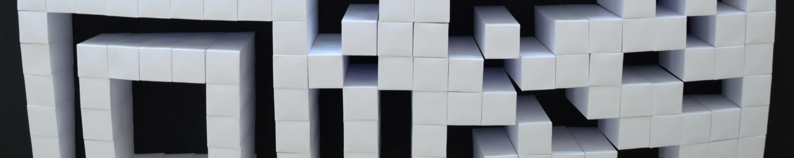 A band of the code close up, the square position marker at the left and the blocks breaking up to the right