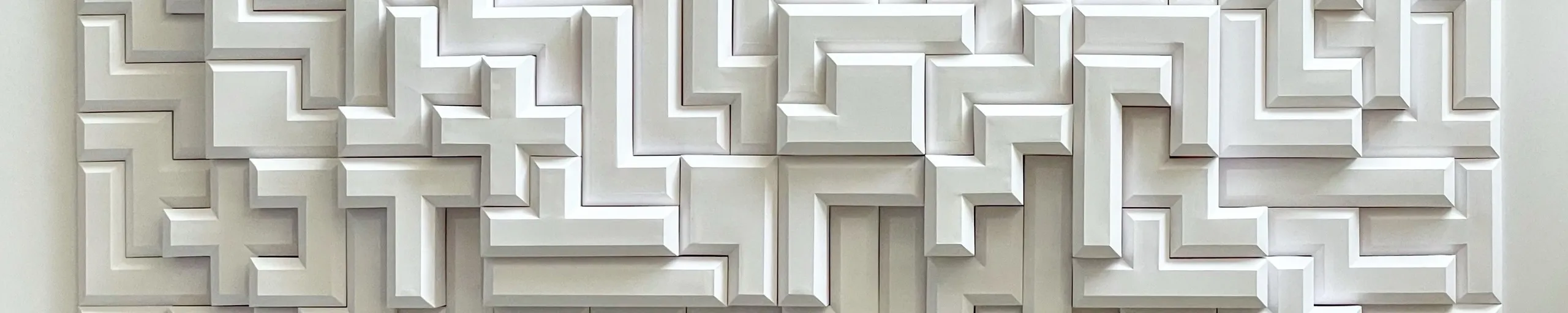 A band across the labyrinth, the edge of the relief standing clear of the wall at the left